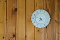 On wooden background Rustic classic retro round clock