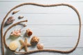 Wooden background with starfish, sea shells and marine rope Royalty Free Stock Photo