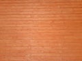 Wooden background. Texture of wood. The wall of a wooden house made of timber. Royalty Free Stock Photo