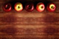 Wooden Background On Top Side Five Apples. Generative AI Royalty Free Stock Photo