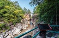 Wooden balcony and river stream going through rocky canyon Op Khan National Park , Chiang Mai.Thailand