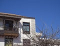 Wooden balcony typical on traditional house in colonial style in Royalty Free Stock Photo