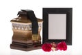 Wooden ballot box with blank mourning frame and flower Royalty Free Stock Photo