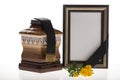 Wooden ballot box with blank mourning frame and flower