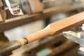 Wooden baluster lathe, unfocused background, shaped. Carpentry