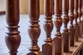 Wooden balustrade of classic staircase in modern house. Close-up Royalty Free Stock Photo