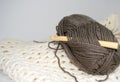 Wooden bamboo crochet hook in bundle of yarn