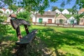 A wooden bank in the park next to many colorful old traditional wine cellers in Villanykovesd in a hungarian wine region Royalty Free Stock Photo