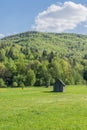 Wooden barns in the field Royalty Free Stock Photo