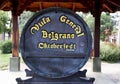 Wooden barrel with the name of the city Villa General Belgrano in Calamuchita. Cordoba Argentina. Carved poster. Oktoberfest beer