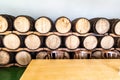 Barrels with fermenting wine stand indoors Royalty Free Stock Photo