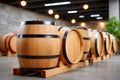 Wooden barrels aging wine in a modern cellar Royalty Free Stock Photo