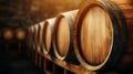 Wooden barrels stacked neatly in a rustic setting, showcasing craftsmanship and the essence of aging and fermentation Royalty Free Stock Photo