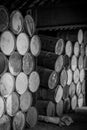 wooden barrels stacked in old abandoned industry building Royalty Free Stock Photo