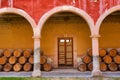 Wooden barrels under the arches