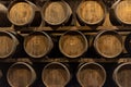 Wooden barrels for wine aging in the cellar..Italian wine