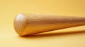 Wooden baseball bat on a solid yellow background Royalty Free Stock Photo