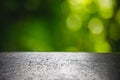 Wooden basis and green nature bokeh background