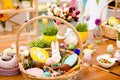 Wooden basket with easter composition, sweets, choco, gingerbrea