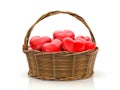 Wooden basket filled with red hearts