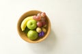 A wooden basket full of fruits,banana,orange,grape,longan Royalty Free Stock Photo