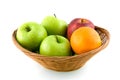 Wooden basket with mixed fruit Royalty Free Stock Photo