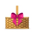 Wooden basket with pink ribbon