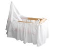 Wooden Bassinet with White Drapes Royalty Free Stock Photo