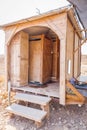 Wooden bathroom shower eco mobile tourism travel facility. Royalty Free Stock Photo