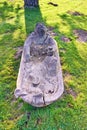 Wooden bathtub sculpture with man on the beach promenade on the island Usedom