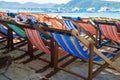 Wooden beach chairs on the beach for tourist Royalty Free Stock Photo