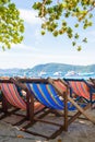 Wooden beach chairs on the beach for tourist Royalty Free Stock Photo