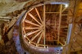 Wooden beams, attic. Part of the reconstruction of an ancient castle tower. Wooden roof elements. Latvia Bauka castle.