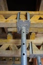 Wooden beams and girders supporting construction of a concrete floor in the newly constructed building Royalty Free Stock Photo