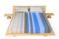 Wooden bed with mattress Royalty Free Stock Photo