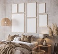 Wooden bedroom design with gallery wall frame mockup in loft apartment interior Royalty Free Stock Photo