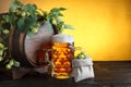 Beer barrel with fresh hop cones Royalty Free Stock Photo
