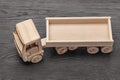 Miniature wooden toy truck photo in studio. Royalty Free Stock Photo