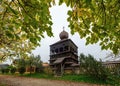 Wooden bell tower belonging to a wooden church in Hronsek, registered as a UNESCO World Heritage Site. Royalty Free Stock Photo