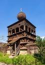 Wooden bell tower belonging to a wooden church in Hronsek, registered as a UNESCO World Heritage Site. Royalty Free Stock Photo