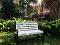 Wooden Bench around green for total relaxation