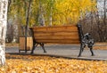 Wooden bench in the autumn Park. Rear view Royalty Free Stock Photo