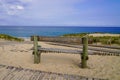 Wooden bench back view of the bay of basin Arcachon in cap ferret city France Royalty Free Stock Photo