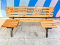 Wooden bench built to keep social distance due to the corona virus epidemic Royalty Free Stock Photo