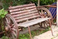 Wooden bench with cart wheels, Alanya, Turkey, April 2021 Royalty Free Stock Photo