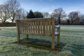Wooden Bench in Countryside Memorial Garden
