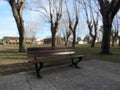 Wooden bench in a deserted square