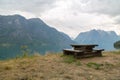 Wooden bench in fjord