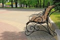 Wooden bench with forged fragments Royalty Free Stock Photo