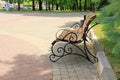 Wooden bench with forged fragments Royalty Free Stock Photo